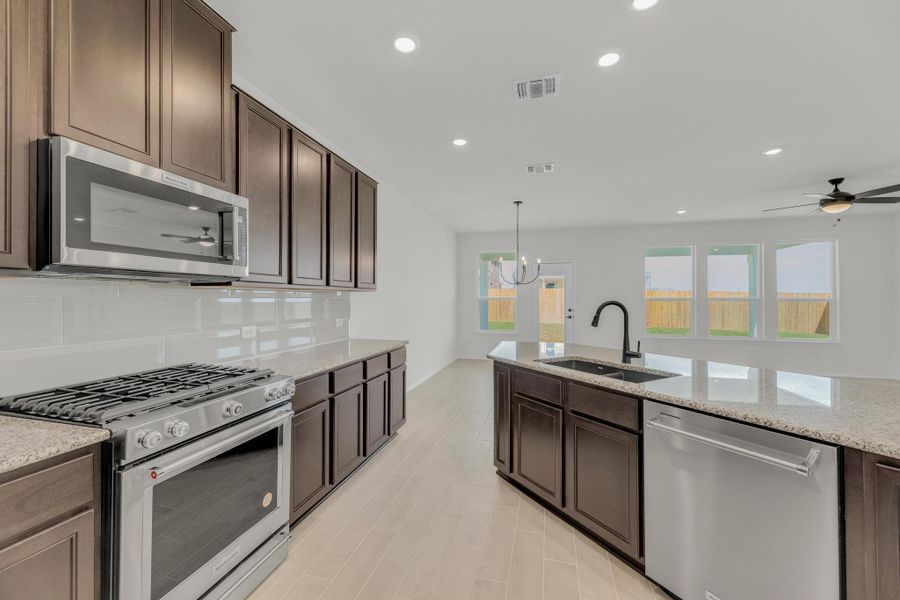 Furnished interior view inside a new home in Salerno - Classic Collection, Round Rock (Image 13). Furnished interior view inside a new home in Salerno - Classic Collection, Round Rock (Image 13).