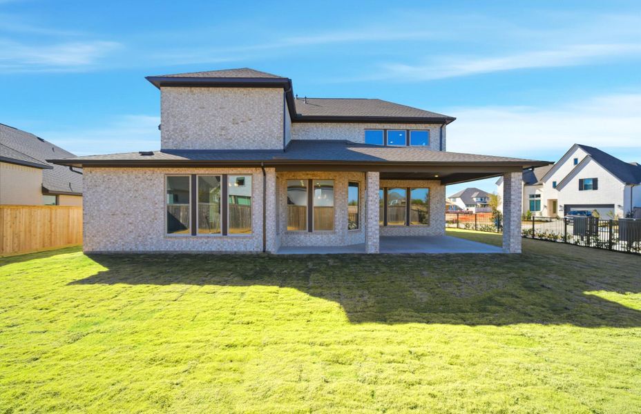 Exterior details and patio area of a home in Bridgeland 60′, Cypress (Image 22).