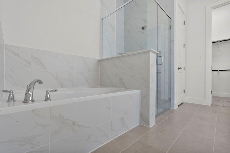 Primary Bath retreat with garden tub & walk-in shower Primary Bath retreat with garden tub & walk-in shower