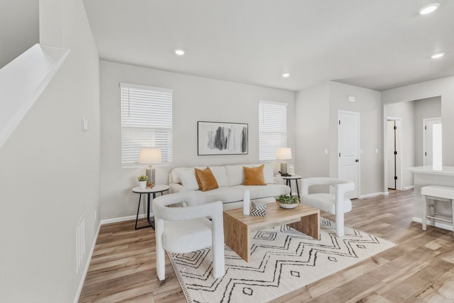 Furnished interior view inside a new home in Woodrose at Painted Prairie, Aurora (Image 7).