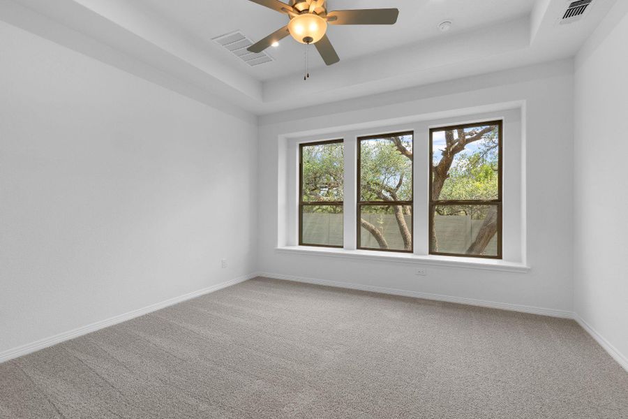 Primary Bedroom with tray ceiling Primary Bedroom with tray ceiling
