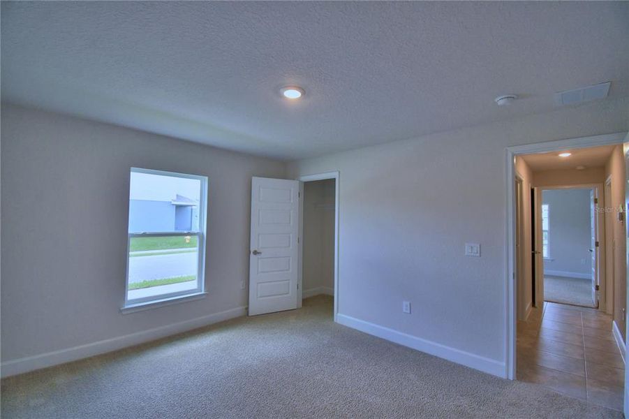 Spacious, unfurnished interior of a new home in Cadence Crossing, Auburndale (Image 12).
