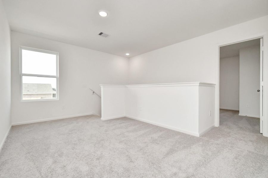 Spacious, unfurnished interior of a new home in Sunterra, Katy (Image 25).