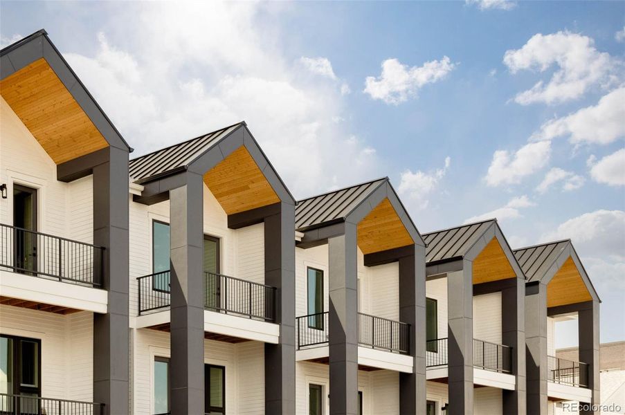 Front exterior of a new home in A Line Townhomes, Denver, CO, highlighting curb appeal (Image 1).