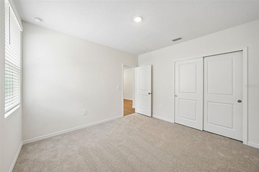 Spacious, unfurnished interior of a new home in Pine Ridge Meadows, Hudson (Image 21).