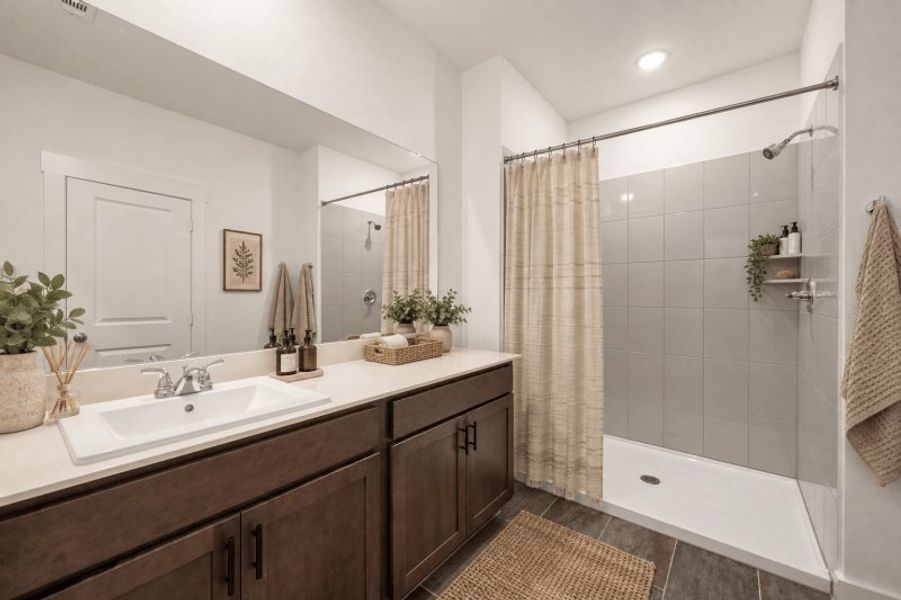 Representative furnished interior of a home built from the Jenna Modern by Cadence Homes in Pecan Square, Northlake (Image 7).