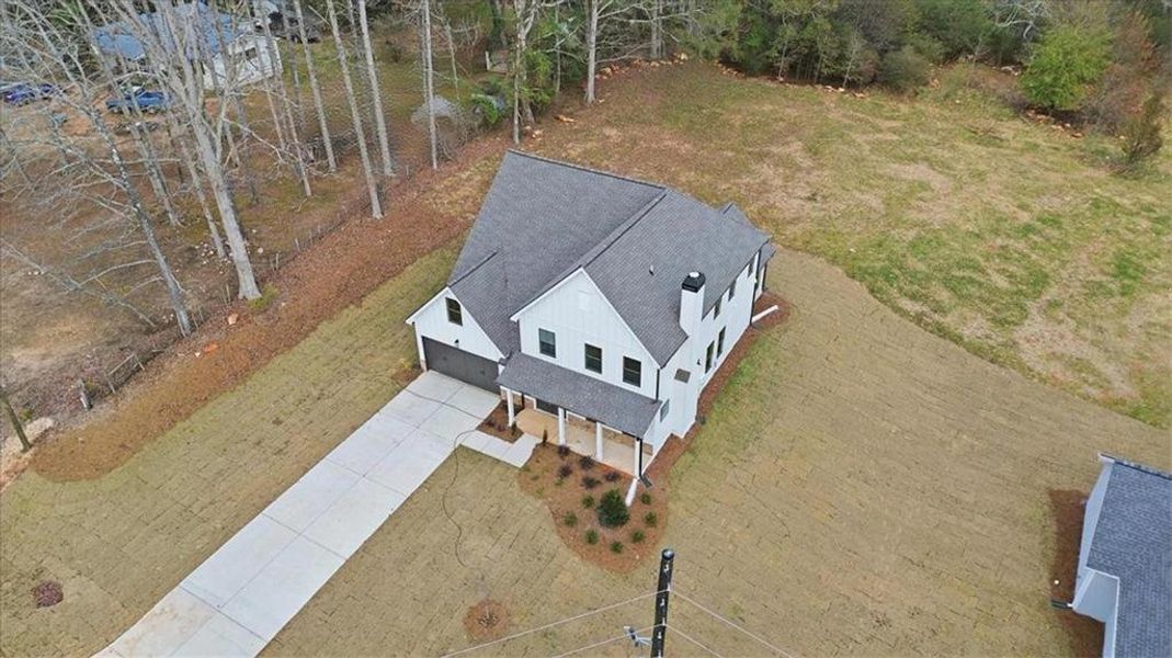Front exterior of a new home in , Statham, GA, highlighting curb appeal (Image 30).