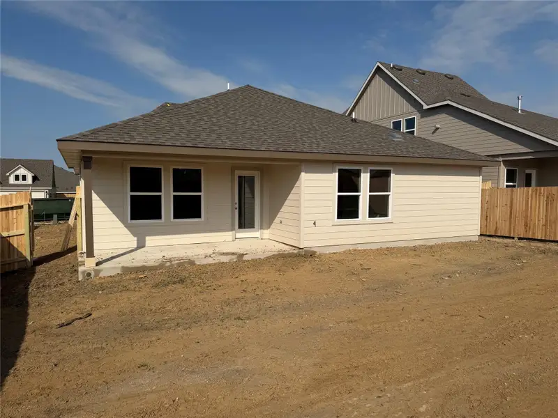 Exterior details and patio area of a home in Liberty Village, Brenham (Image 3).