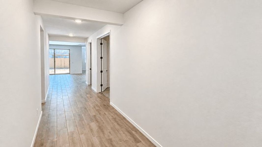 Spacious, unfurnished interior of a new home in The Grove at El Cidro, Goodyear (Image 6).