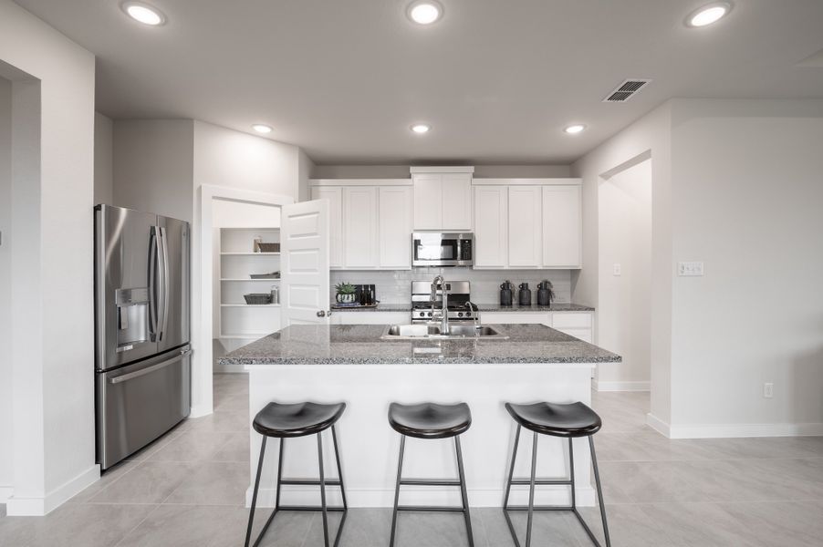 Representative furnished interior of a home built from the Caddo by Tri Pointe Homes in Mason Woods, Cypress (Image 49).