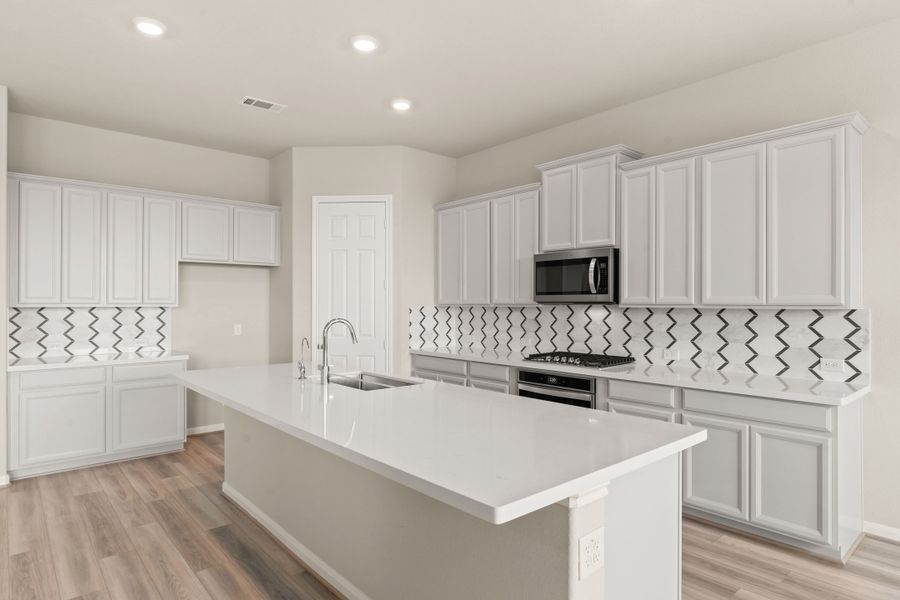 Representative furnished interior of a home built from the Sydney by Ashton Woods in Sunterra Lakes, Brookshire (Image 10). Representative furnished interior of a home built from the Sydney by Ashton Woods in Sunterra Lakes, Brookshire (Image 10).