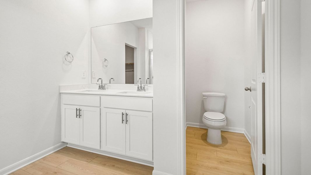 Furnished interior view inside a new home in Revelry, Del Valle (Image 10).