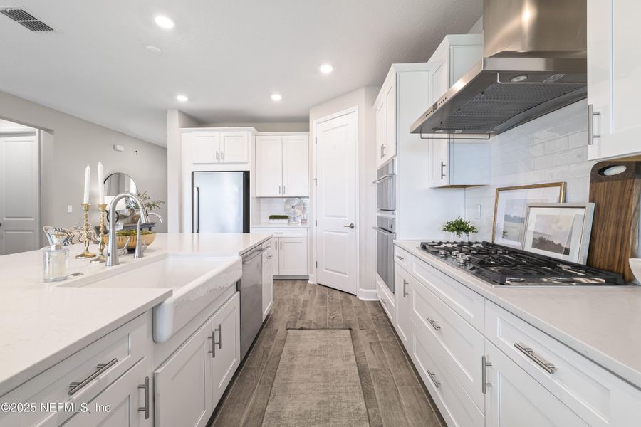 Furnished interior view inside a new home in The Cove at Beachwalk, St. Johns (Image 23). Furnished interior view inside a new home in The Cove at Beachwalk, St. Johns (Image 23).