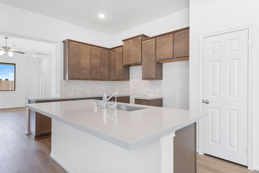 This kitchen is not only a functional space but also has ample storage. Whether you're a seasoned chef or just love to gather and enjoy good food, this kitchen is a dream come true. This kitchen is not only a functional space but also has ample storage. Whether you're a seasoned chef or just love to gather and enjoy good food, this kitchen is a dream come true.