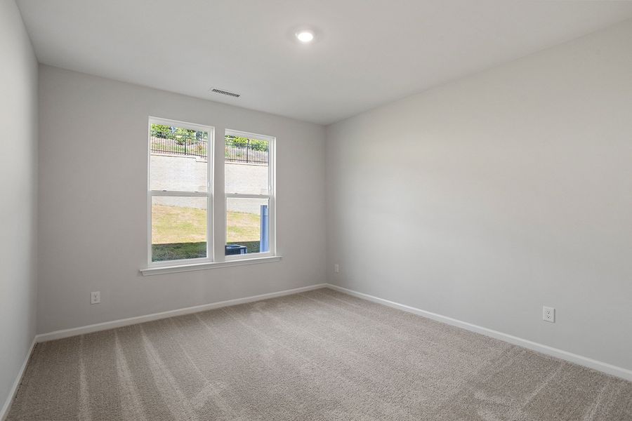 Spacious, unfurnished interior of a new home in Ovation at Sweetbrier, Durham (Image 22).