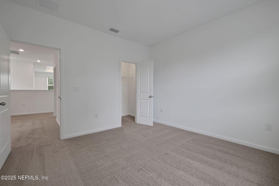 Spacious, unfurnished interior of a new home in The Hammock at Palm Harbor, Palm Coast (Image 24).