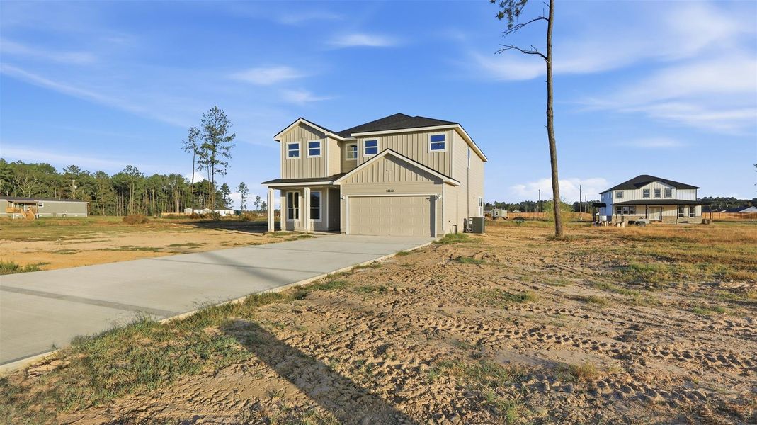 Exterior details and patio area of a home in , Conroe (Image 3). Exterior details and patio area of a home in , Conroe (Image 3).