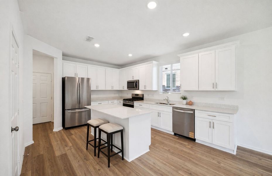 Representative furnished interior of a home built from the Camelia by Pulte Homes in Saddleback at Santa Rita Ranch, Liberty Hill (Image 14).