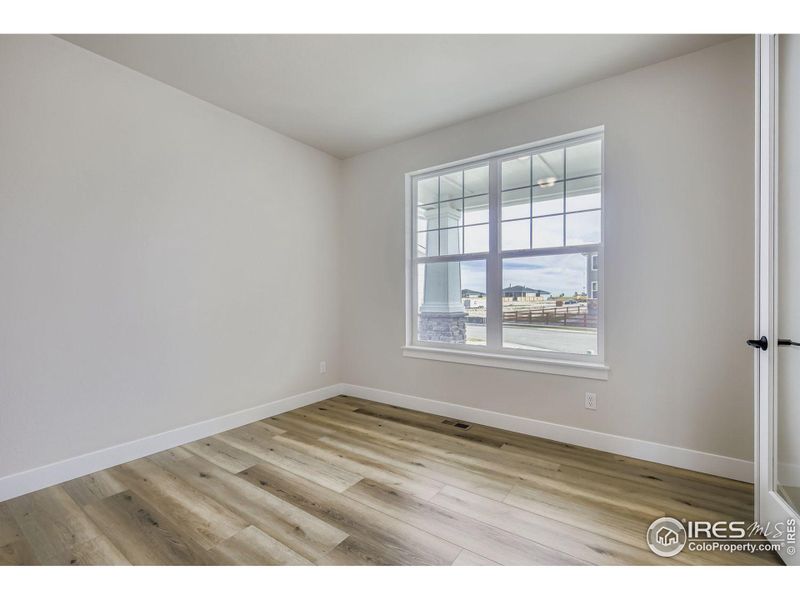 Spacious, unfurnished interior of a new home in RainDance National 60/70, Windsor (Image 16).