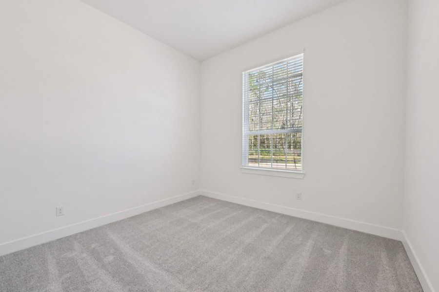 Spacious, unfurnished interior of a new home in The Woodlands Hills, Willis (Image 33).