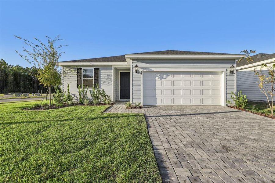 Exterior details and patio area of a home in Colbert Landings, Palm Coast (Image 2).