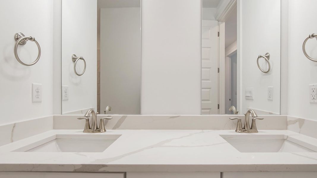 Representative furnished interior of a home built from the Camellia by D.R. Horton in Breakfast Point East Phase II, Panama City Beach (Image 14).
