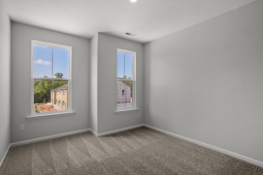 Spacious, unfurnished interior of a new home in Sweetbrier, Durham (Image 29).