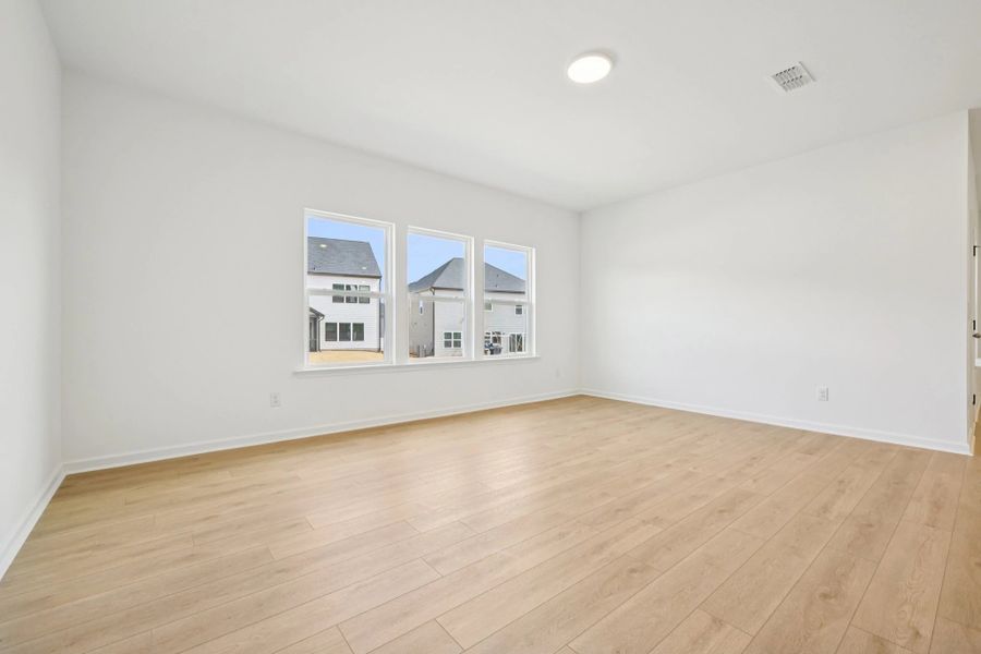 Family Room featuring the AW Collection® Sapphire - Bold tones and playful patterns shine here.