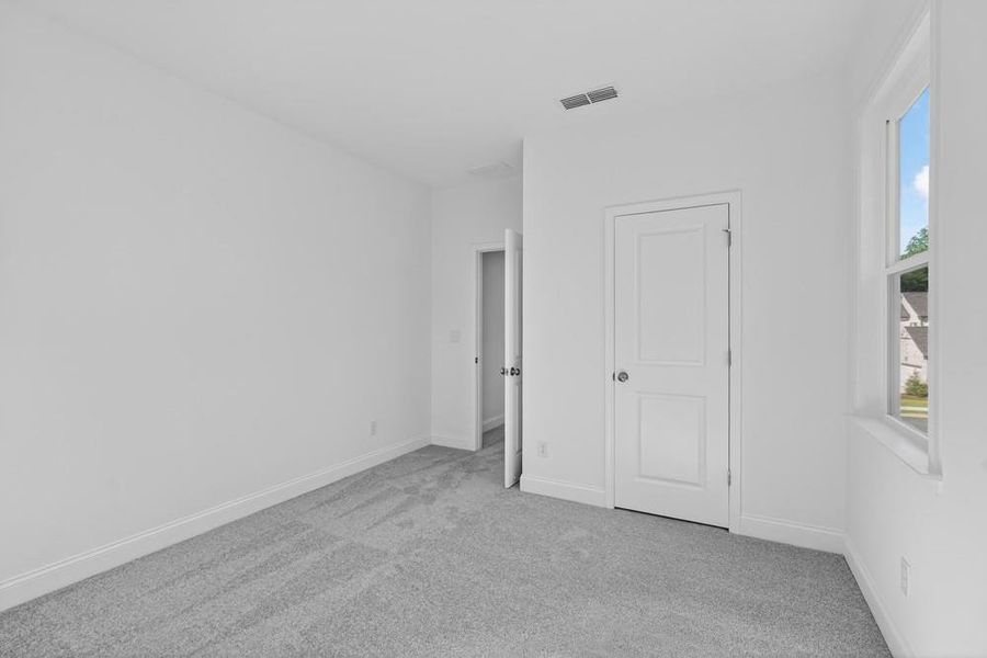 Spacious, unfurnished interior of a new home in Bailey Fence, Dacula (Image 40).