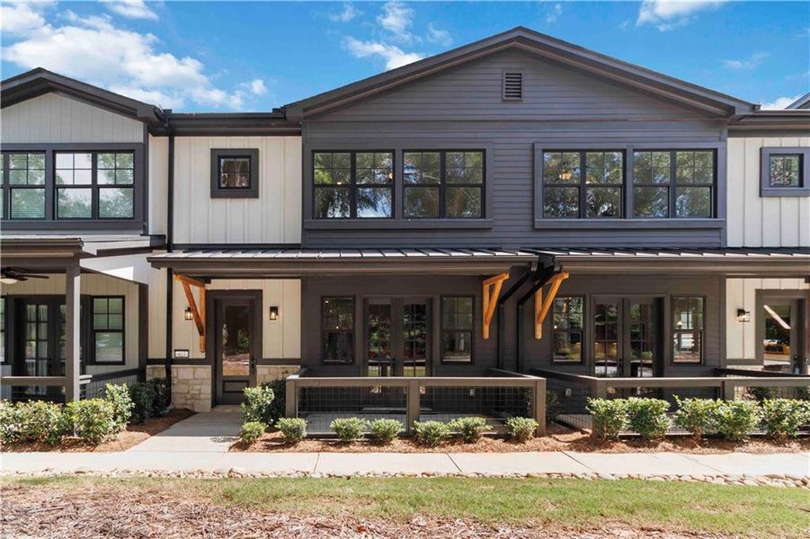 Front exterior of a new home in Serenity, Hapeville, GA, highlighting curb appeal (Image 1).