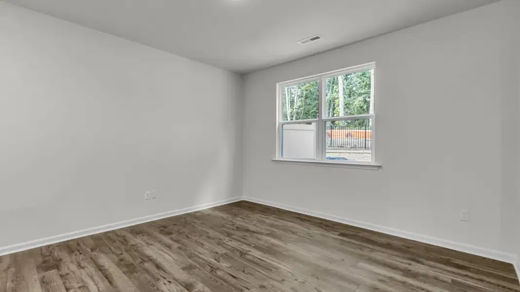 Spacious, unfurnished interior of a new home in The Townes at Prestleigh, Wake Forest (Image 14).