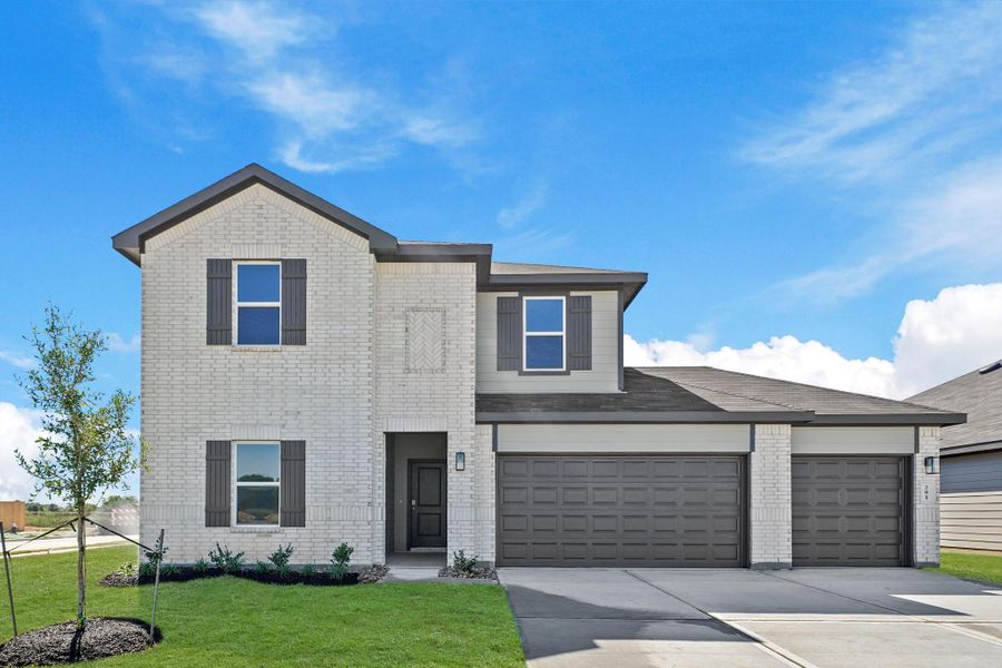 Front exterior of a new home in Medina, Dayton, TX, highlighting curb appeal (Image 15).