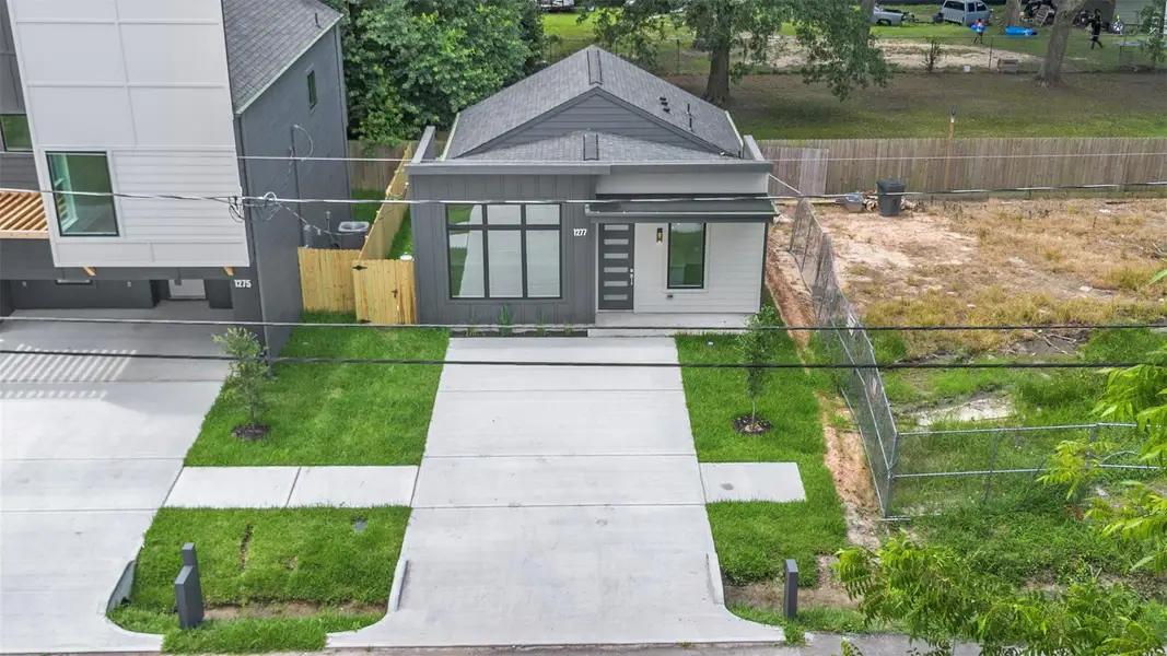 Front exterior of a new home in , Houston, TX, highlighting curb appeal (Image 23). Front exterior of a new home in , Houston, TX, highlighting curb appeal (Image 23).