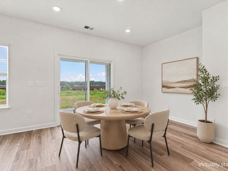 Furnished interior view inside a new home in Waterside - Boardwalk Series, Longs (Image 9).