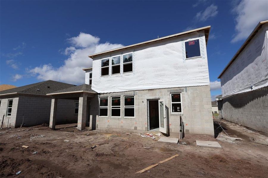 In-progress construction of a new home in Eden at Crossprairie, St. Cloud, FL (Image 13).