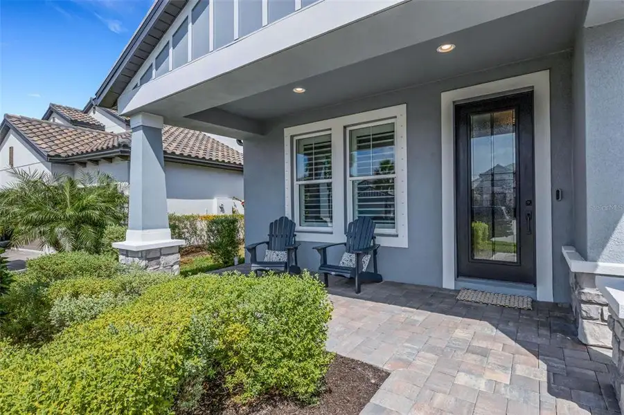 Exterior details and patio area of a home in , Bradenton (Image 3).
