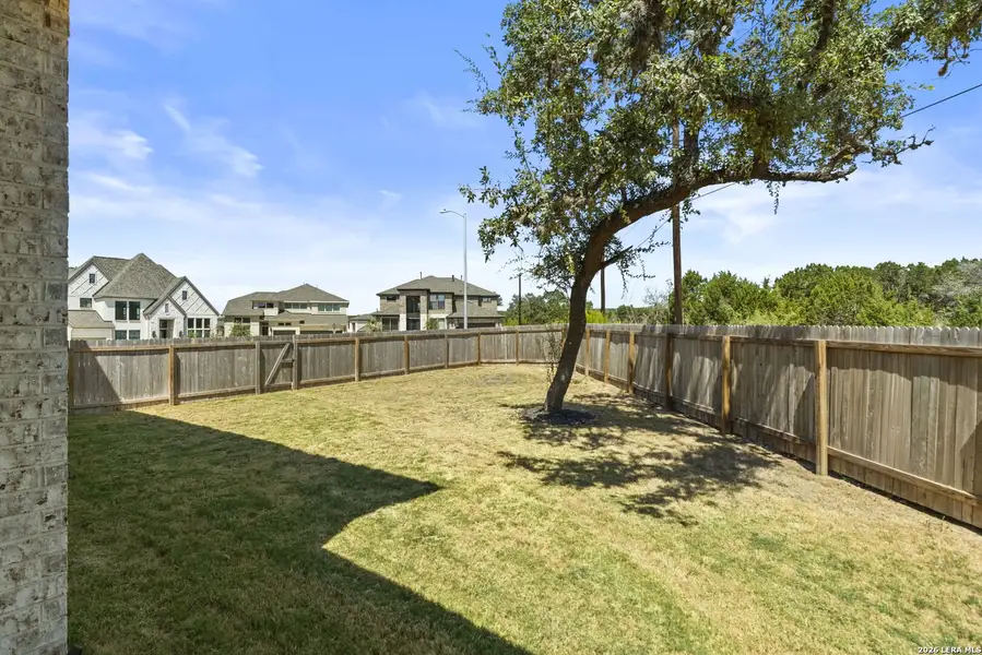 Exterior details and patio area of a home in Kallison Ranch, San Antonio (Image 3).