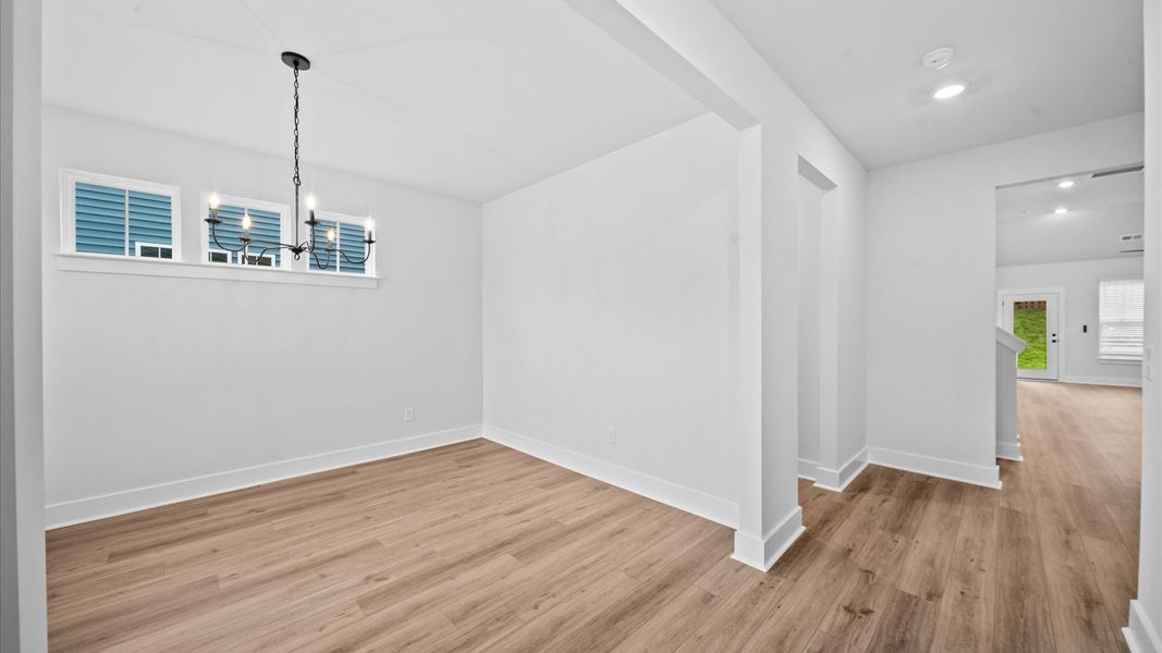 Tasteful dining area with current design in this vibrant two-story townhome Tasteful dining area with current design in this vibrant two-story townhome