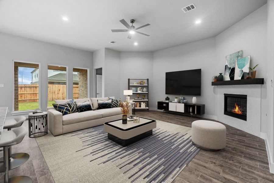 VS Family Room. Family room flooded with natural light through the expansive windows. The premium tile flooring adds a touch of luxury to the space, creating the perfect setting for relaxing moments and cherished gatherings with loved ones. Sample photo of completed home with similar floor plan. Actual colors and selections may vary. VS Family Room. Family room flooded with natural light through the expansive windows. The premium tile flooring adds a touch of luxury to the space, creating the perfect setting for relaxing moments and cherished gatherings with loved ones. Sample photo of completed home with similar floor plan. Actual colors and selections may vary.