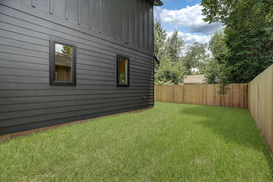 Exterior details and patio area of a home in , Houston (Image 4).