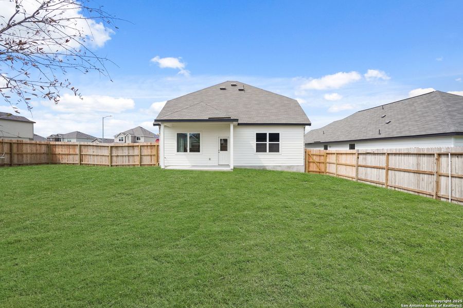 Front exterior of a new home in Cinco Lakes, San Antonio, TX, highlighting curb appeal (Image 1). Front exterior of a new home in Cinco Lakes, San Antonio, TX, highlighting curb appeal (Image 1).