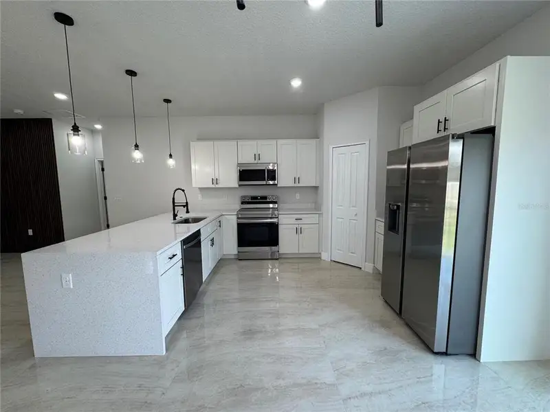 Furnished interior view inside a new home in , Ocala (Image 5).