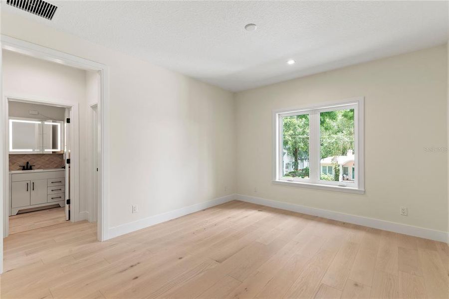 Bedroom 2 with en suite bathroom and walk-in closet Bedroom 2 with en suite bathroom and walk-in closet
