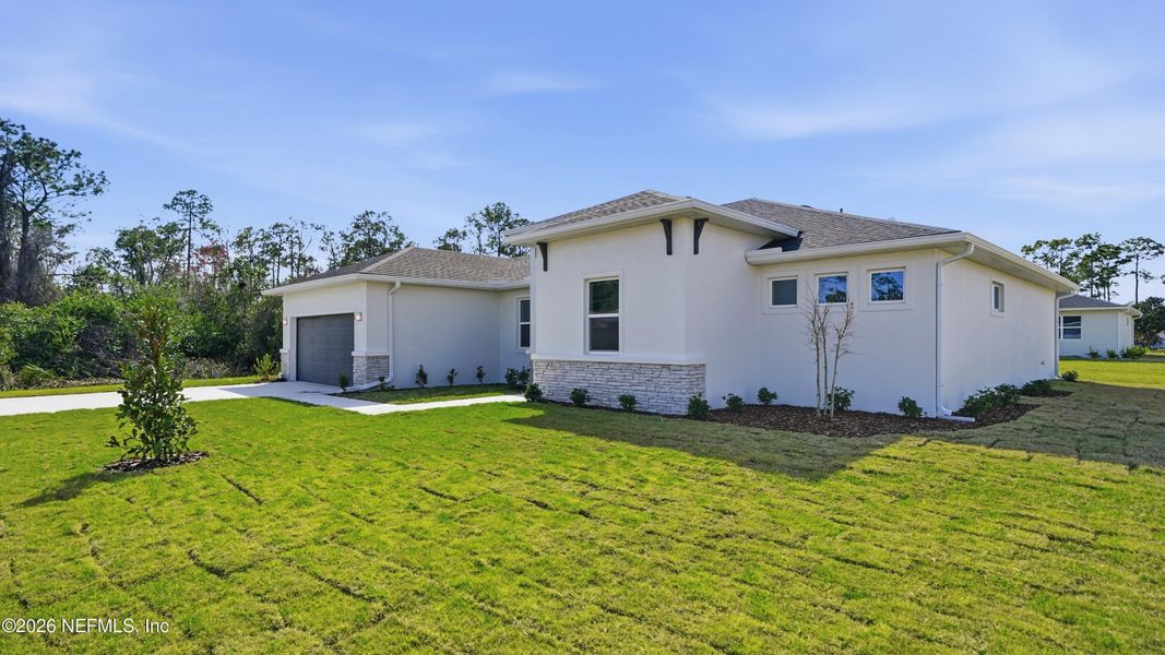Exterior details and patio area of a home in , Palm Coast (Image 28).