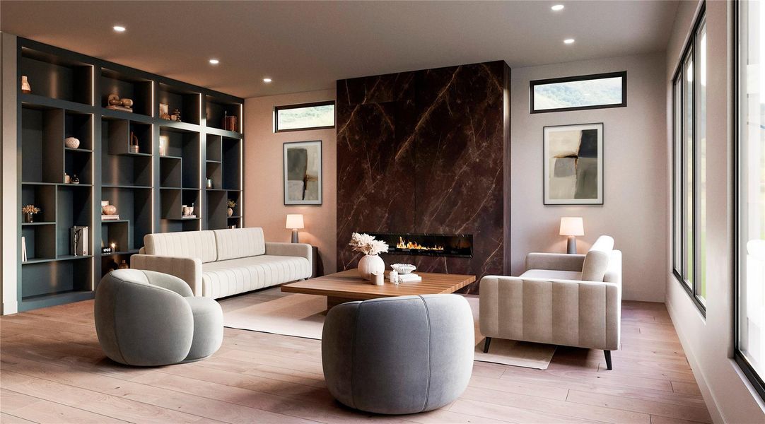 The ample living room, with an eye catching floor to ceiling fireplace, becomes a cozy retreat filled with natural light. Designer built-in on the left to portrait all your art and treasures. This is a render.