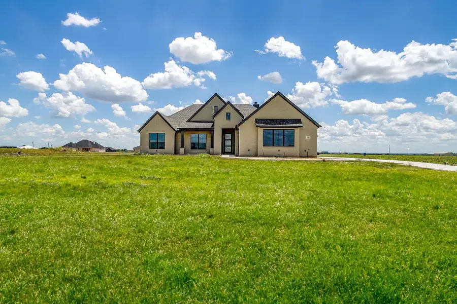 Front exterior of a home in the Matthews Farm community, located in Venus, TX (Image 2). Front exterior of a home in the Matthews Farm community, located in Venus, TX (Image 2).