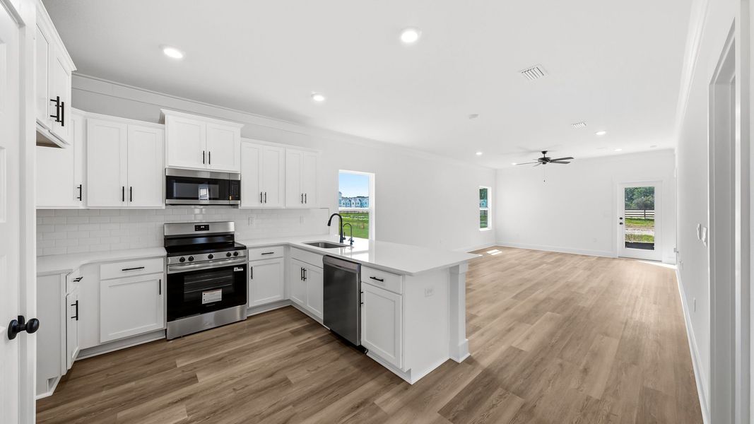 Furnished interior view inside a new home in Colonial East, Panama City Beach (Image 4).