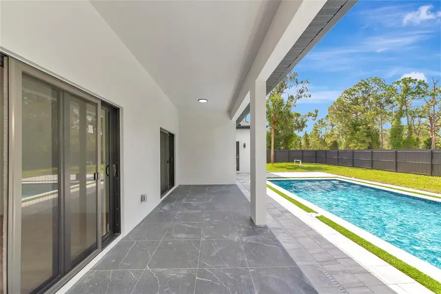 Exterior details and patio area of a home in , North Port (Image 4).