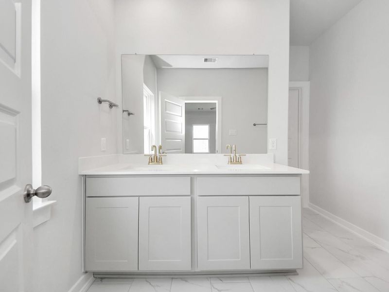 Furnished interior view inside a new home in Sunterra, Katy (Image 5).