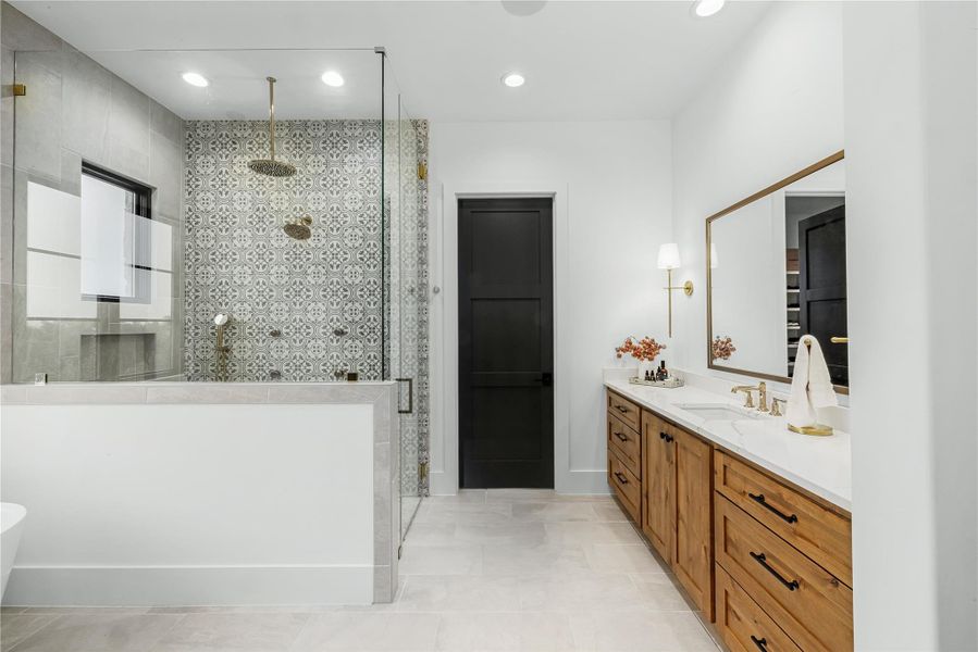 Bathroom featuring vanity and walk in shower